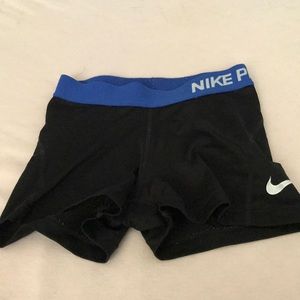 Nike pro shorts. Black with a blue waste band